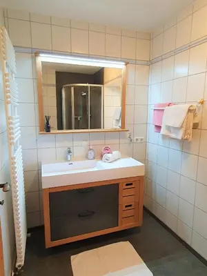 Ein Badezimmer in der Unterkunft Wexhaus