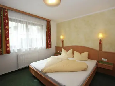 Ein Bett oder Betten in einem Zimmer der Unterkunft Apartment in Kaltenbach near Ski Lift