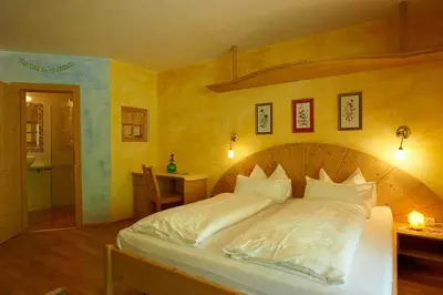 Ein Bett oder Betten in einem Zimmer der Unterkunft Der Grubacher