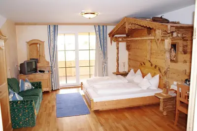 Ein Bett oder Betten in einem Zimmer der Unterkunft Der Grubacher