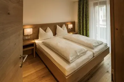 Ein Bett oder Betten in einem Zimmer der Unterkunft Appartements Hubenhof