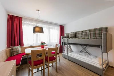 Ein Bett oder Betten in einem Zimmer der Unterkunft Appartements Hubenhof