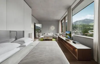 Ein Bett oder Betten in einem Zimmer der Unterkunft Schwarzer Adler Kitzbühel - Adults Only