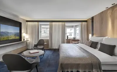 Ein Bett oder Betten in einem Zimmer der Unterkunft Hotel Weisses Roessl