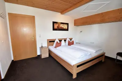 Ein Bett oder Betten in einem Zimmer der Unterkunft Haus Waldner
