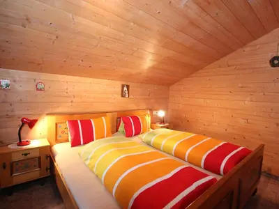 Ein Bett oder Betten in einem Zimmer der Unterkunft Apartment Untererhof-4 by Interhome