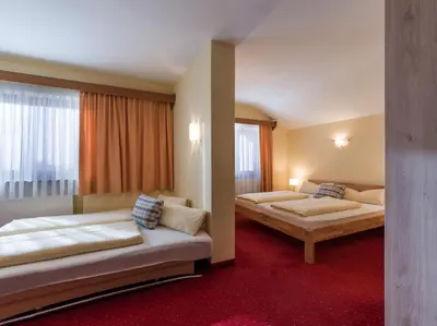 Ein Bett oder Betten in einem Zimmer der Unterkunft Pension Elisabeth