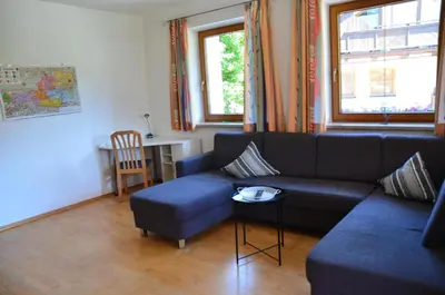 Ein Sitzbereich in der Unterkunft Bichlerhof