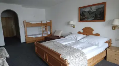 Ein Bett oder Betten in einem Zimmer der Unterkunft Hotel Wiesenegg