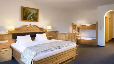 Ein Bett oder Betten in einem Zimmer der Unterkunft Hotel Wiesenegg