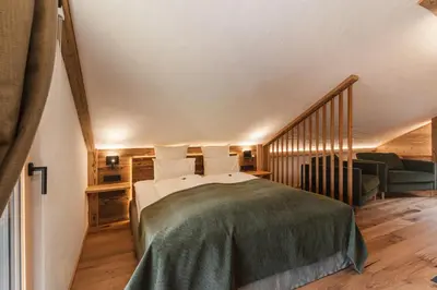 Ein Bett oder Betten in einem Zimmer der Unterkunft Hotel Leitenhof 4 Sterne Superior