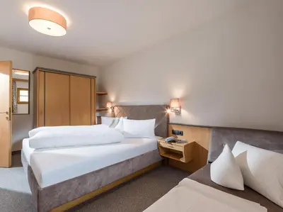 Ein Bett oder Betten in einem Zimmer der Unterkunft Appart Johanna