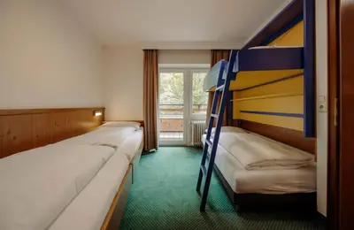 Ein Bett oder Betten in einem Zimmer der Unterkunft TheResi Appartements