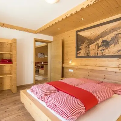 Ein Bett oder Betten in einem Zimmer der Unterkunft Herzl Hof