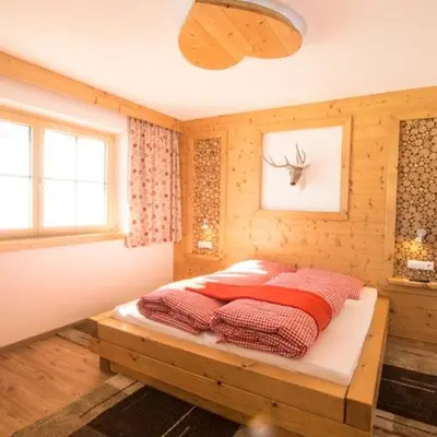 Ein Bett oder Betten in einem Zimmer der Unterkunft Herzl Hof