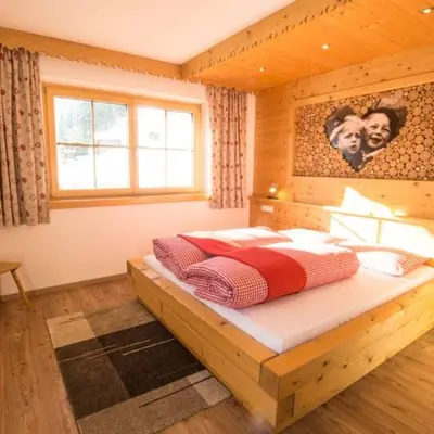Ein Bett oder Betten in einem Zimmer der Unterkunft Herzl Hof