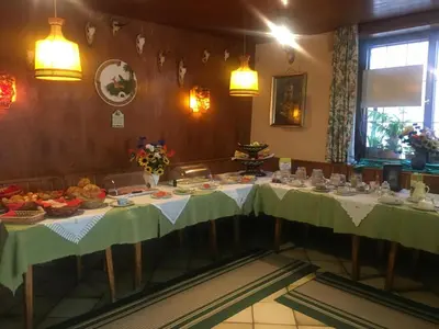 Ein Restaurant oder anderes Speiselokal in der Unterkunft Haus Schlosskeller