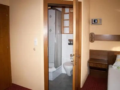Ein Badezimmer in der Unterkunft Pension Handle