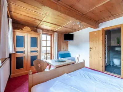 Ein Bett oder Betten in einem Zimmer der Unterkunft Apartment in Kirchberg near Ski Bus