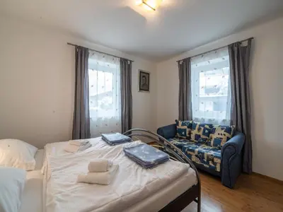 Ein Bett oder Betten in einem Zimmer der Unterkunft Apartment in Kirchberg near Ski Lift