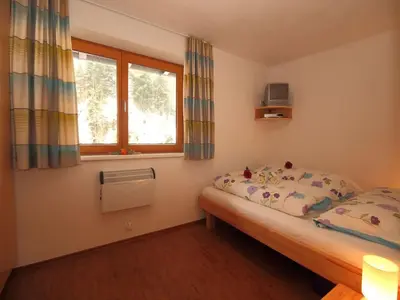 Ein Bett oder Betten in einem Zimmer der Unterkunft Apartment in Brixen near Ski Bus