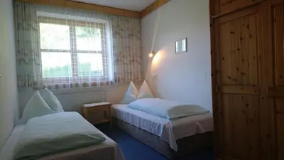 Ein Bett oder Betten in einem Zimmer der Unterkunft Appartementhotel Hechenberg
