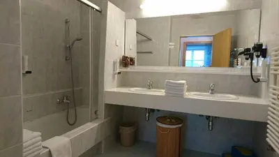 Ein Badezimmer in der Unterkunft Appartementhotel Hechenberg