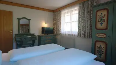 Ein Bett oder Betten in einem Zimmer der Unterkunft Appartementhotel Hechenberg