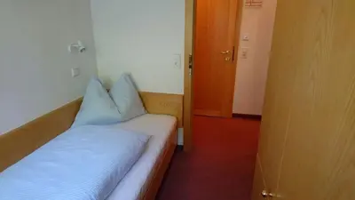 Ein Bett oder Betten in einem Zimmer der Unterkunft Appartementhotel Hechenberg