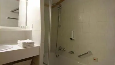 Ein Badezimmer in der Unterkunft Appartementhotel Hechenberg