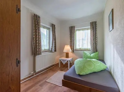 Ein Bett oder Betten in einem Zimmer der Unterkunft Landgasthof Oberlander