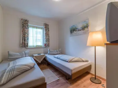 Ein Bett oder Betten in einem Zimmer der Unterkunft Landgasthof Oberlander
