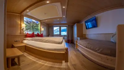 Ein Bett oder Betten in einem Zimmer der Unterkunft Gasthof Tannen - Alm