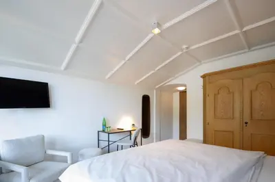 Ein Bett oder Betten in einem Zimmer der Unterkunft Q! Hotel Maria Theresia