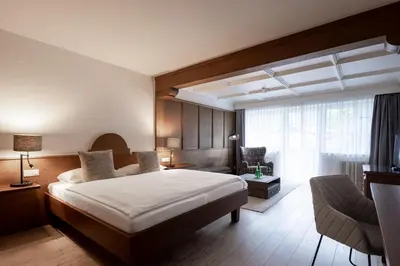 Ein Bett oder Betten in einem Zimmer der Unterkunft Q! Hotel Maria Theresia