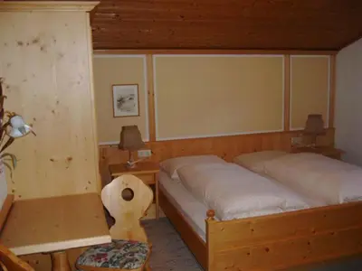 Ein Bett oder Betten in einem Zimmer der Unterkunft Pension Schachernhof