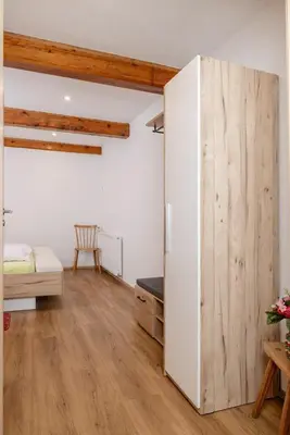 Ein Bett oder Betten in einem Zimmer der Unterkunft Tatscherhof