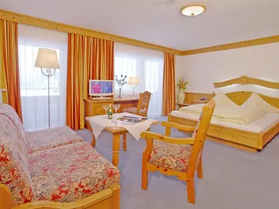 Ein Bett oder Betten in einem Zimmer der Unterkunft Hotel Hagerhof