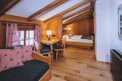 Ein Bett oder Betten in einem Zimmer der Unterkunft AlpenOase Sonnhof