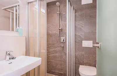 Ein Badezimmer in der Unterkunft AlpenOase Sonnhof