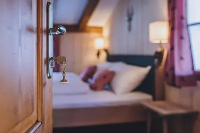 Ein Bett oder Betten in einem Zimmer der Unterkunft AlpenOase Sonnhof