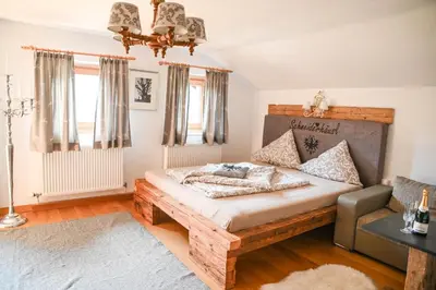 Ein Bett oder Betten in einem Zimmer der Unterkunft Ferienhaus Schneiderhäusl Zillertal