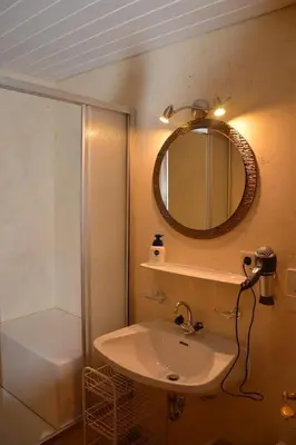 Ein Badezimmer in der Unterkunft Lanzenbauernhof