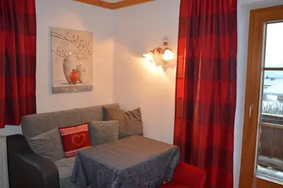Ein Sitzbereich in der Unterkunft Lanzenbauernhof