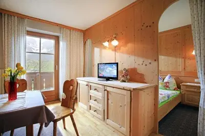 Ein Bett oder Betten in einem Zimmer der Unterkunft Lanzenbauernhof