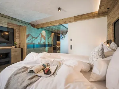 Ein Bett oder Betten in einem Zimmer der Unterkunft Aparthotel Stacherhof