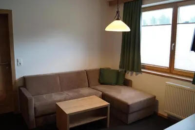 Ein Sitzbereich in der Unterkunft Aparthotel Garni Schranz
