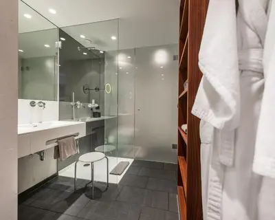 Ein Badezimmer in der Unterkunft AlpenParks Hotel & Apartment Taxacher
