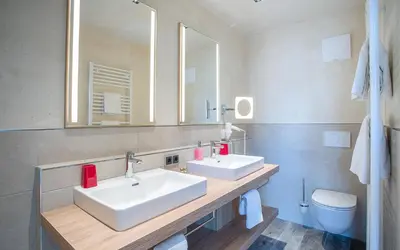 Ein Badezimmer in der Unterkunft Seehotel St Hubertus