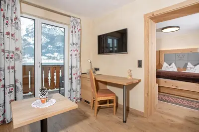 Ein Bett oder Betten in einem Zimmer der Unterkunft Seehotel St Hubertus